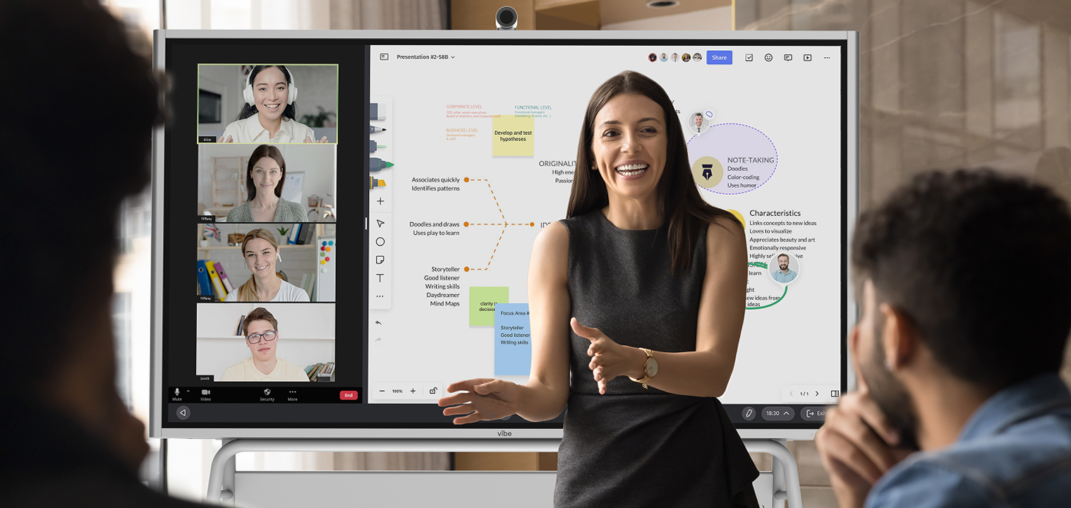 Woman using a Vibe Board to deliver an interactive multimedia presentation.
